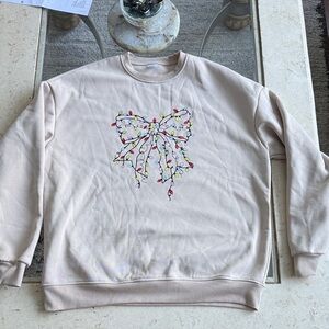 Cream Sweatshirt with Colorful Christmas Lights Bow Design